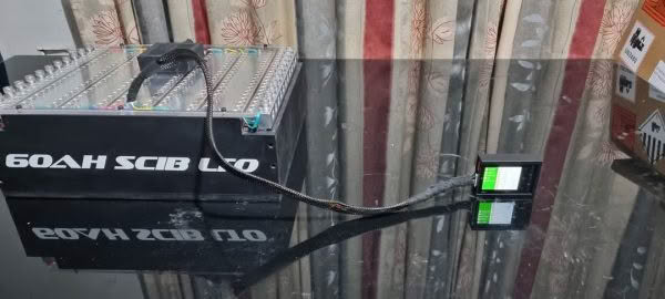 Lithium battery with connected digital display charger.