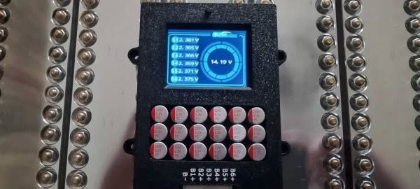 Electronic display with voltage readings on control panel.