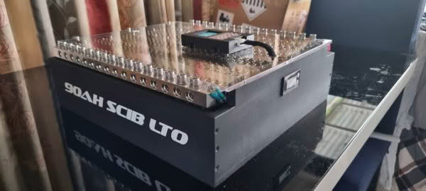 90Ah SCIB LTO battery on reflective surface.