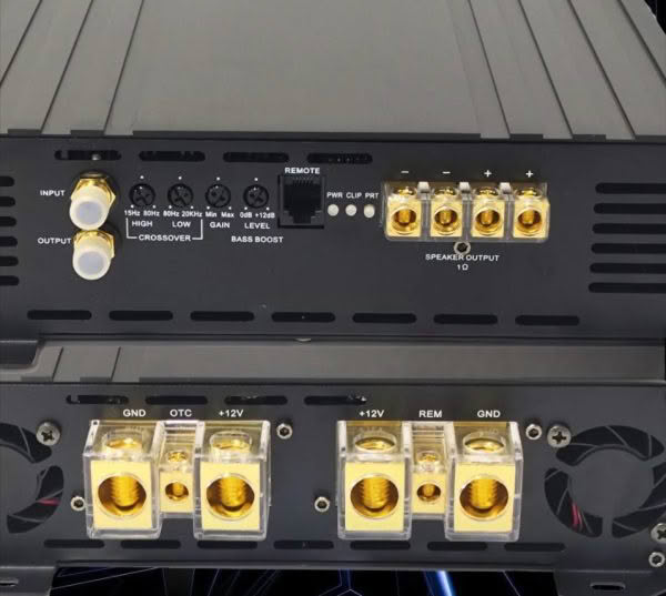 Close-up of audio amplifier connections and ports.