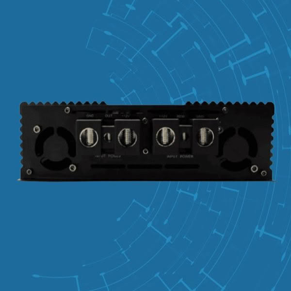 Black amplifier with circular connectors, blue background