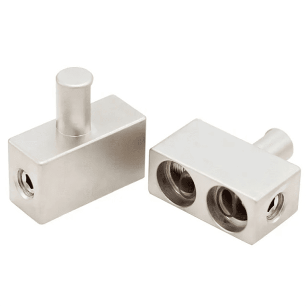 Metallic connectors with cylindrical pins and screw holes for mechanical or electrical use.