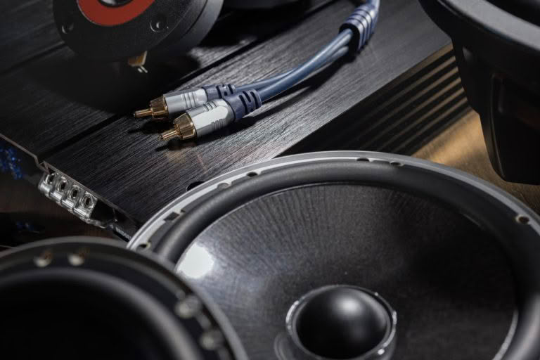 Audio cables and speaker on black equipment