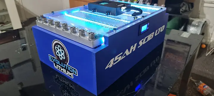 Evolution lithium battery with blue lights and logo.