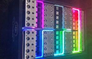 Colorful illuminated dominoes with metal studs.