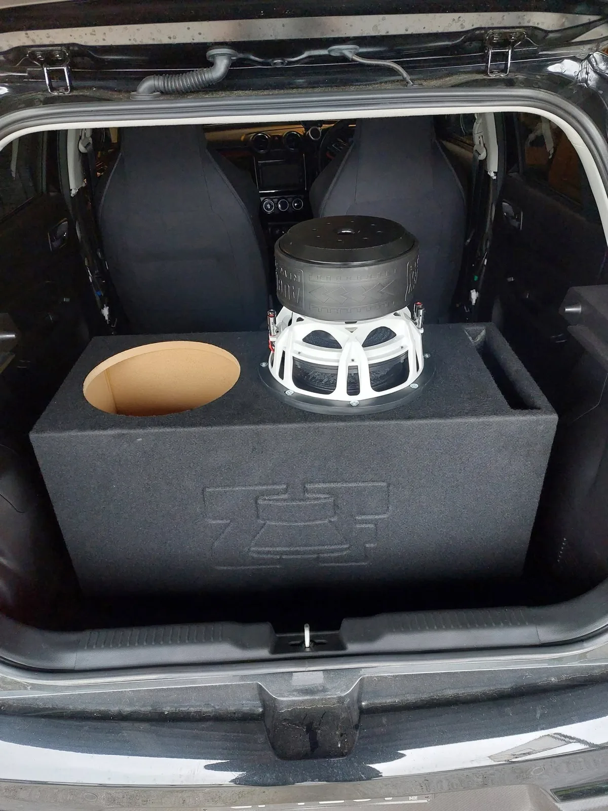 Rear-mounted subwoofer enclosure in Jared Ansley’s vehicle