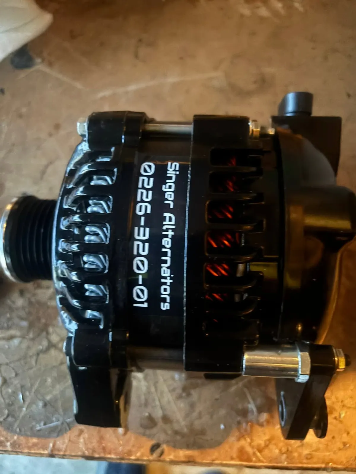 High-output alternator installed for Joseph's Nissan Pulsar electrical system